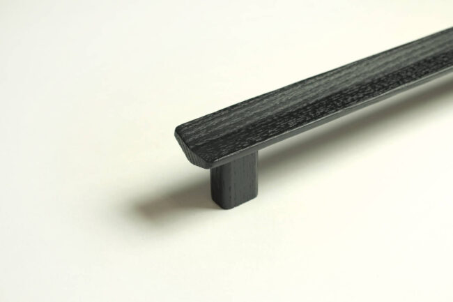 Black version of furniture handle Vis a Vis for Vonsild